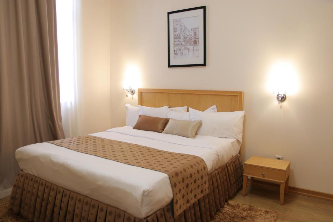 Atb Grand Hotel Atyrau Bagian luar foto