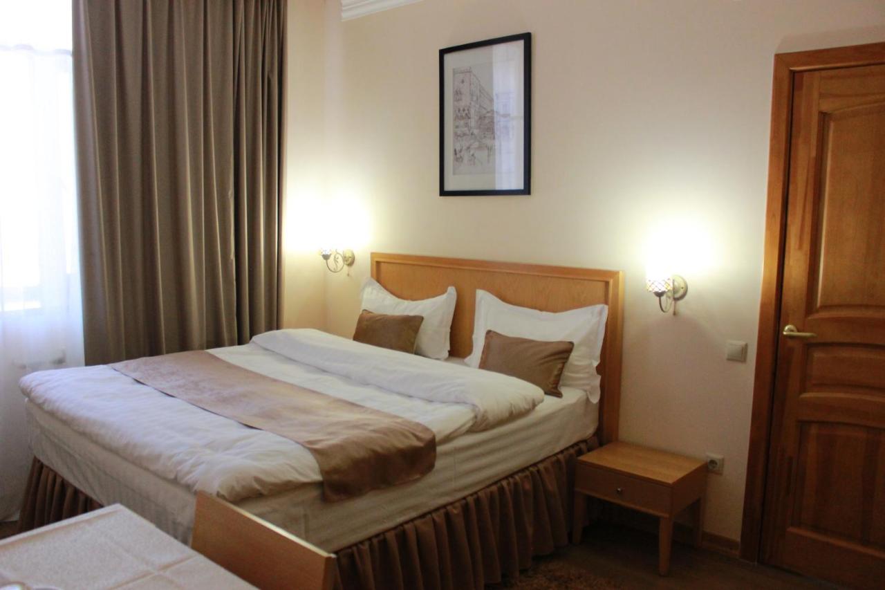 Atb Grand Hotel Atyrau Bagian luar foto