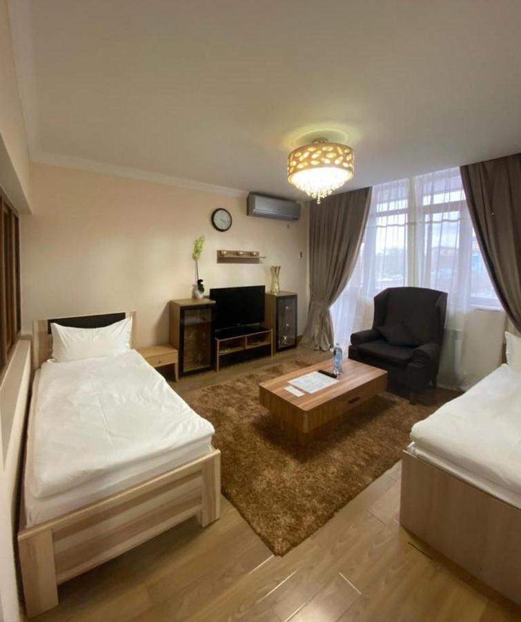 Atb Grand Hotel Atyrau Bagian luar foto